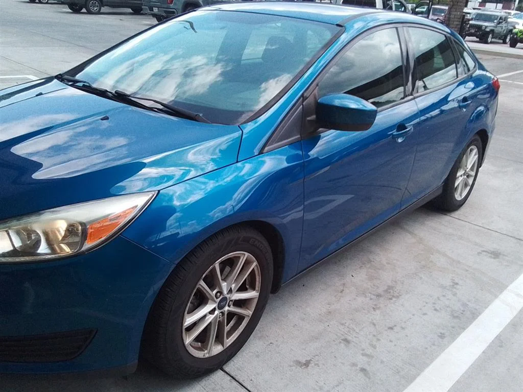 Used 2018 Magnetic Metallic Ford SE image 1
