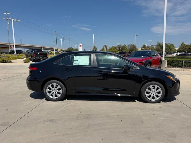 New 2026 Midnight Black Metallic Toyota LE image 3