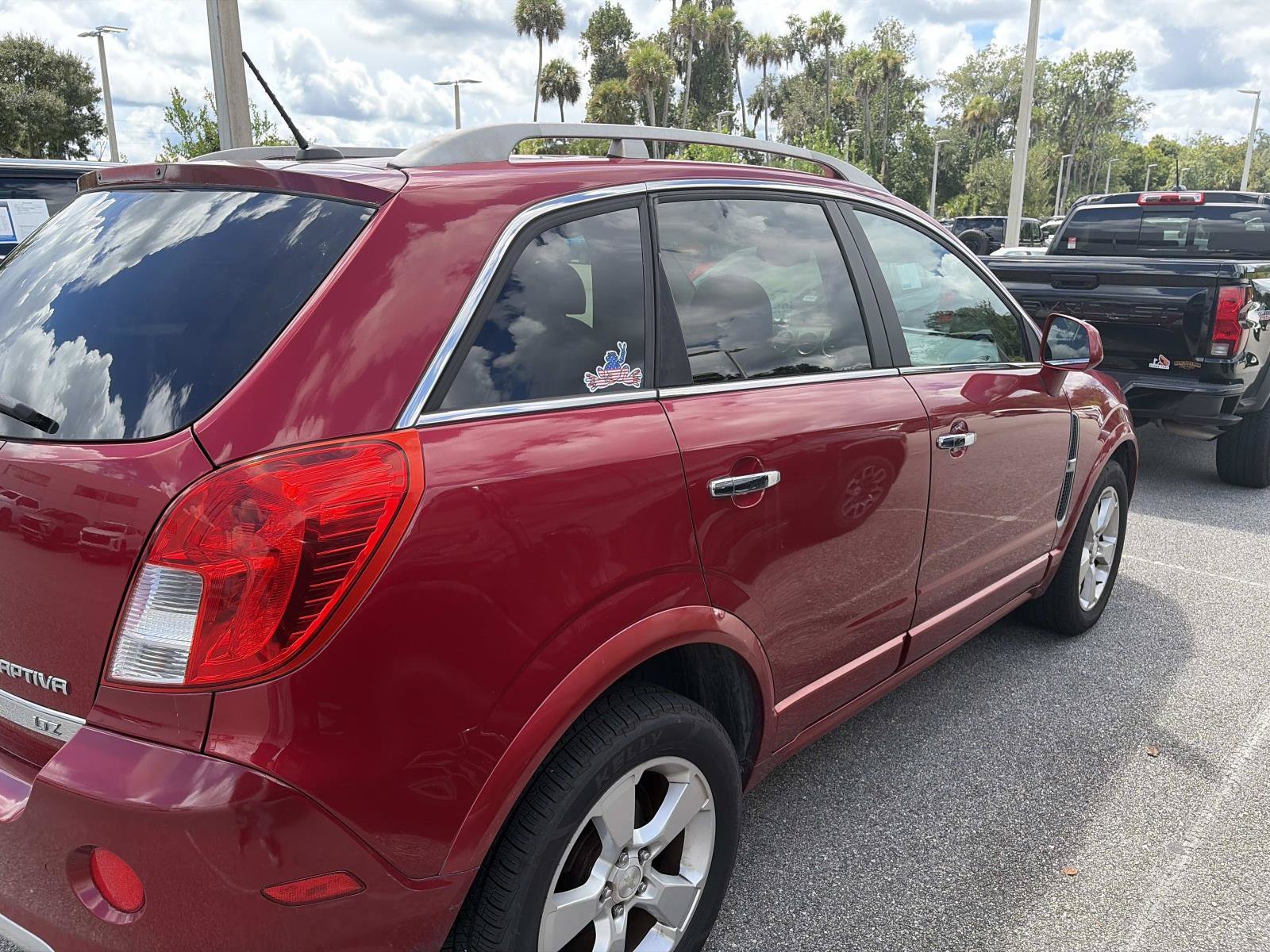 Used 2014 Crystal Red Tintcoat Chevrolet LTZ image 3