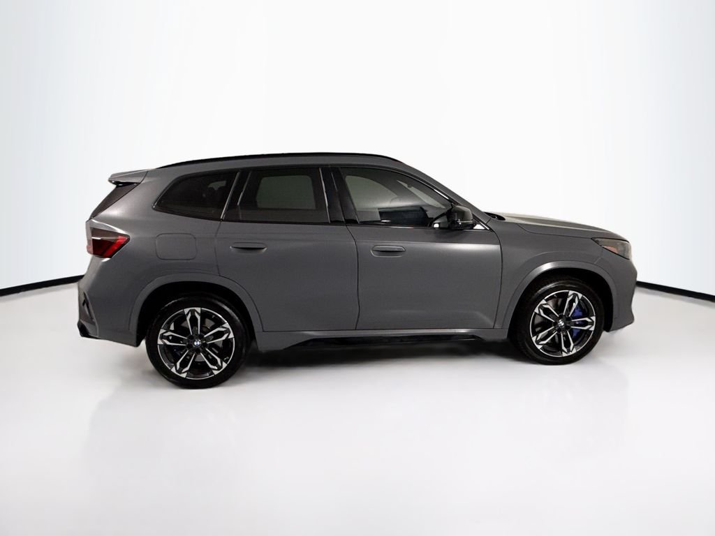 Used 2024 Blue Metallic BMW M35i image 4