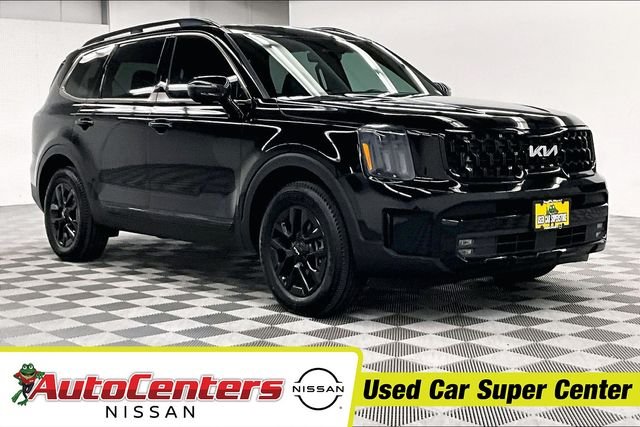 Used 2024 Ebony Black Kia SX-Prestige X-Pro image 1
