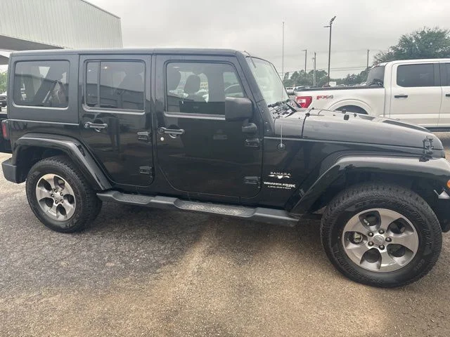 Used 2018 Black Jeep Unlimited Sahara image 4