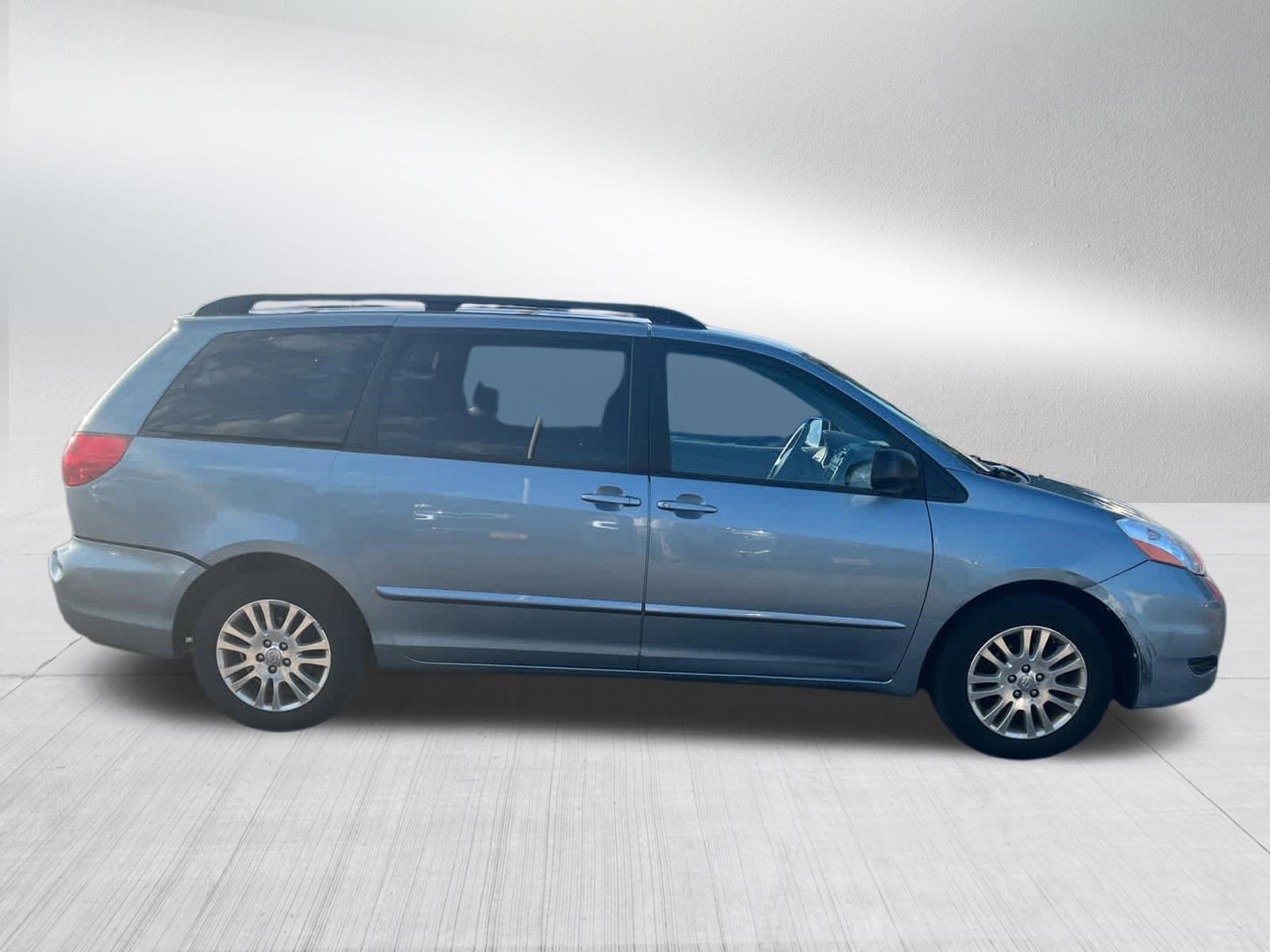 Used 2010 Toyota Sienna LE with VIN 5TDKK4CC7AS330703 for sale in Brooklyn Center, Minnesota