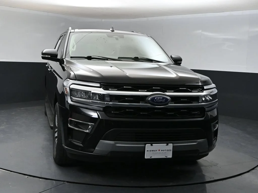 Used 2024 Black Metallic Ford Limited image 6