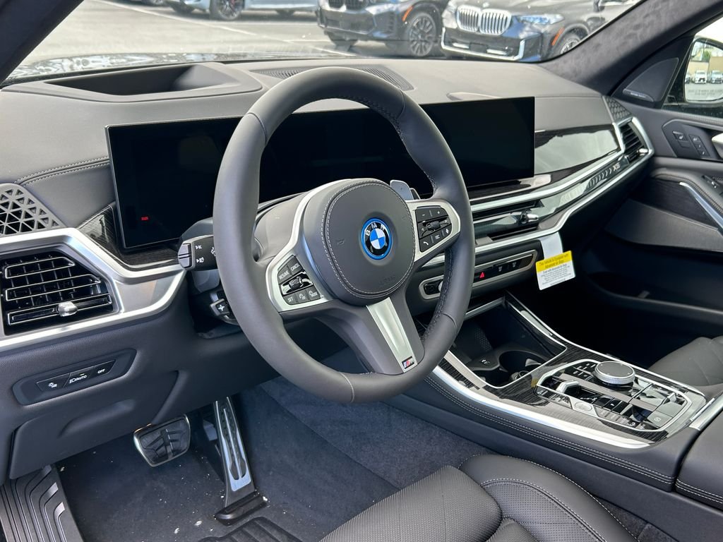 New 2026 Black Sapphire Metallic BMW xDrive50e image 13