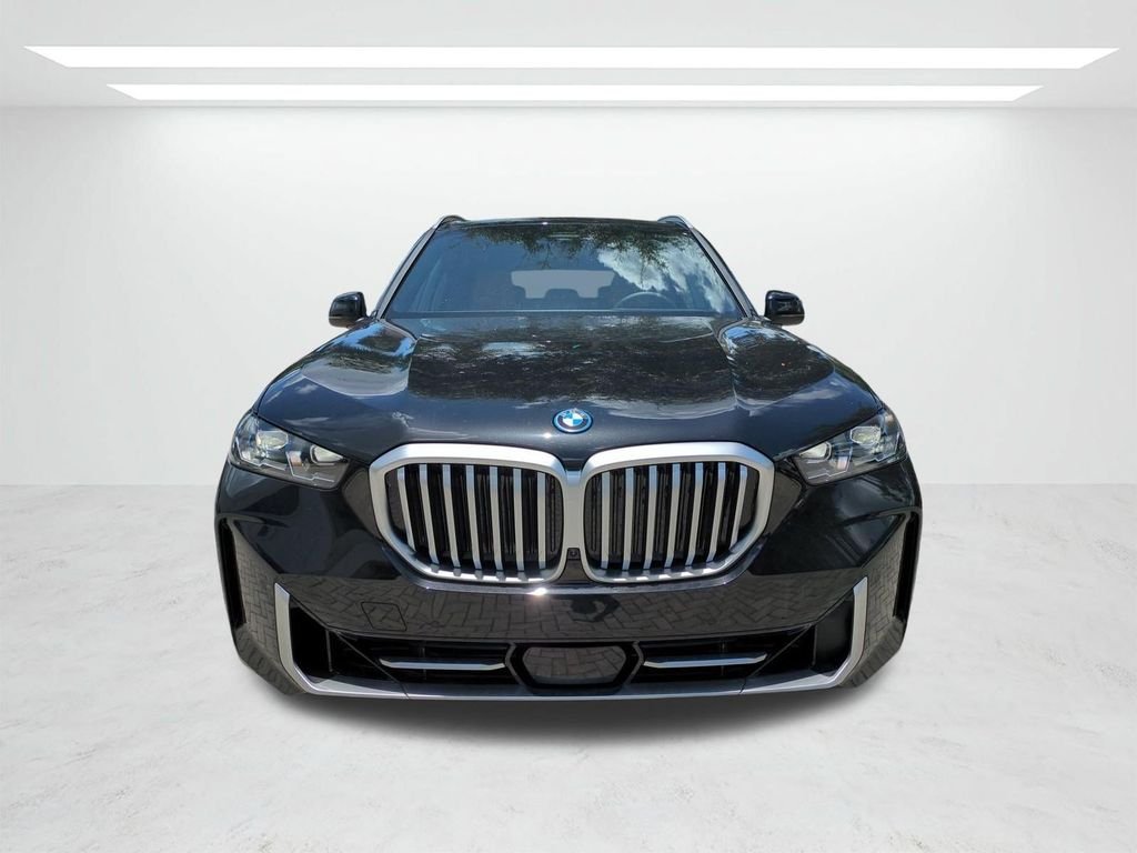 New 2026 Black Sapphire Metallic BMW xDrive50e image 9