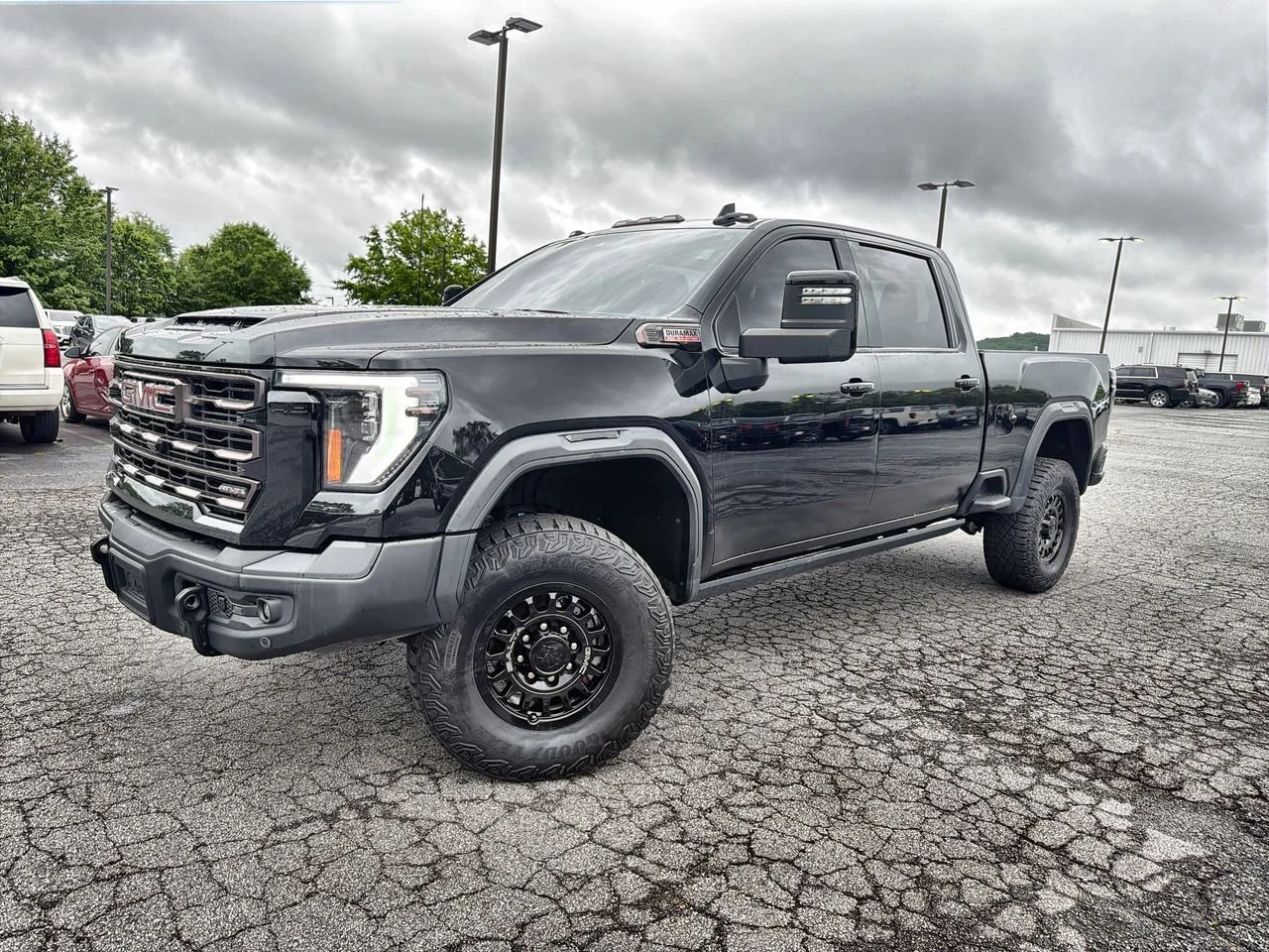 Used 2024 Onyx Black GMC AT4X image 1