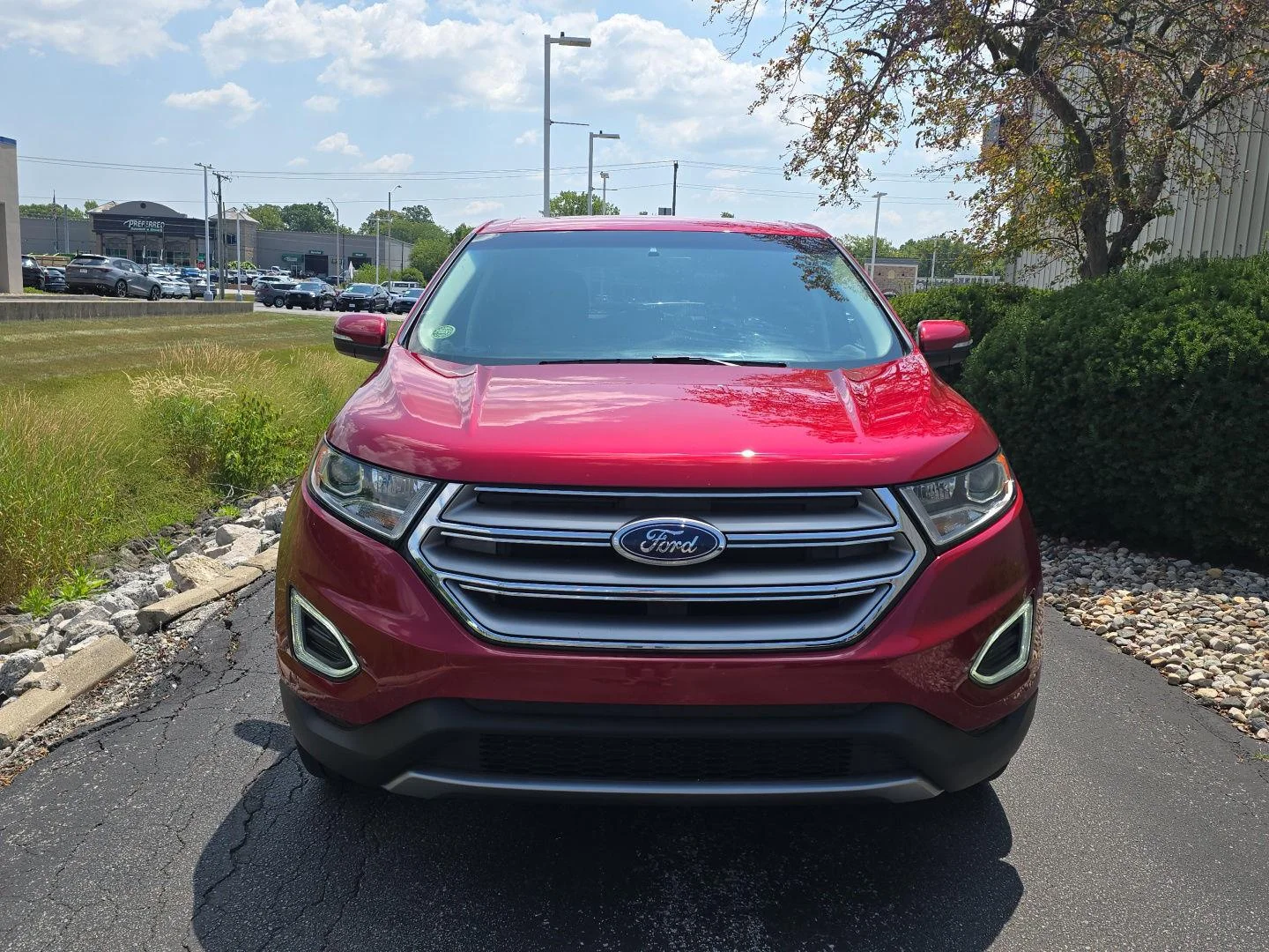 Used 2017 Ruby Red Metallic Tinted Clearcoat Ford Titanium image 2