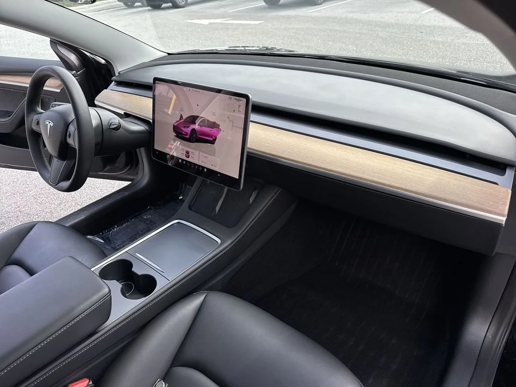 Used 2023 Solid Black Tesla  image 32