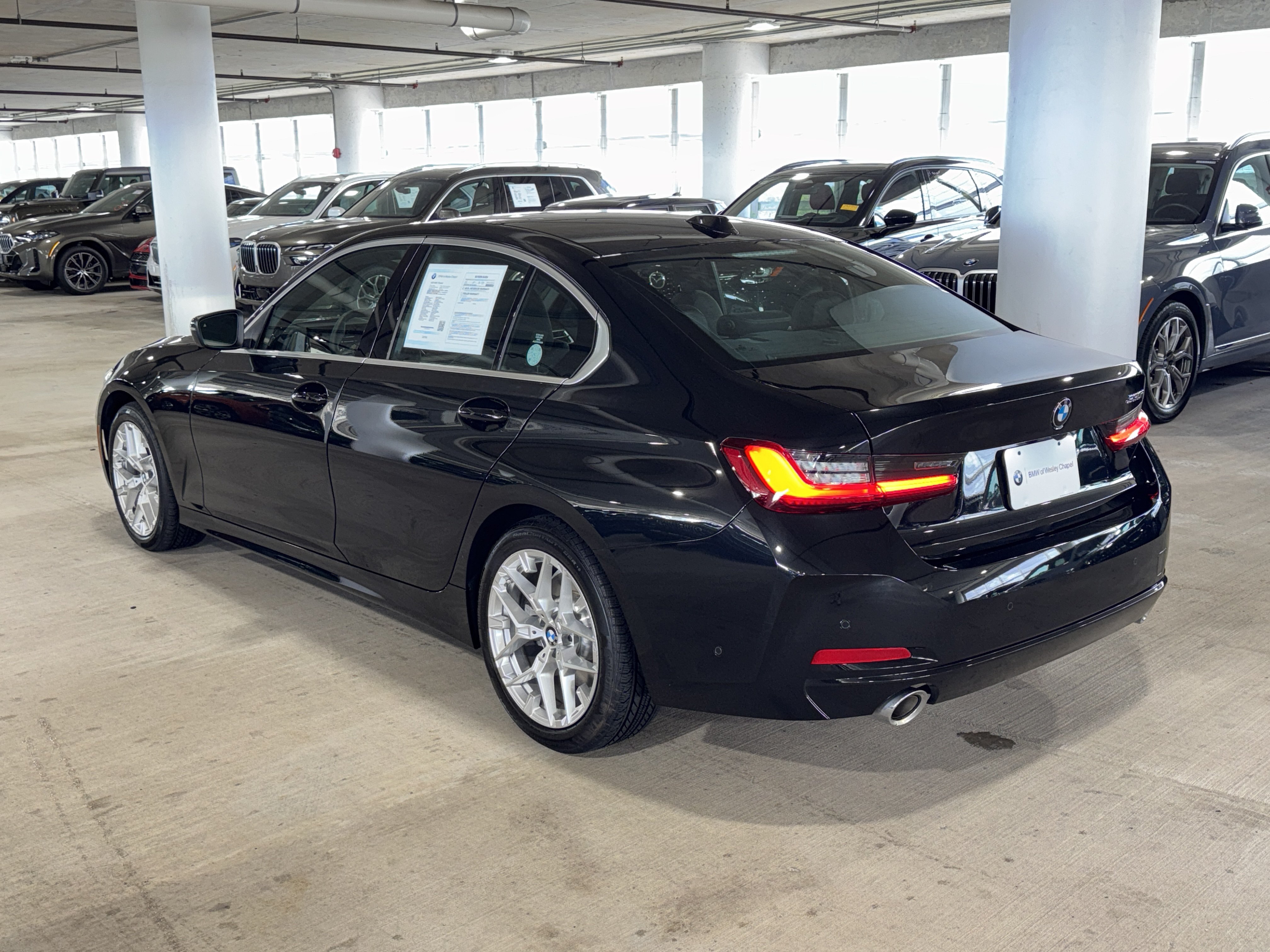 Used 2025 Black Sapphire Metallic BMW 330i image 7