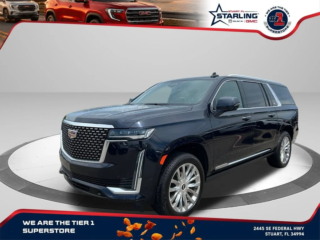 Used 2021 DARK MOON BLUE METALLIC Cadillac Premium Luxury image 1