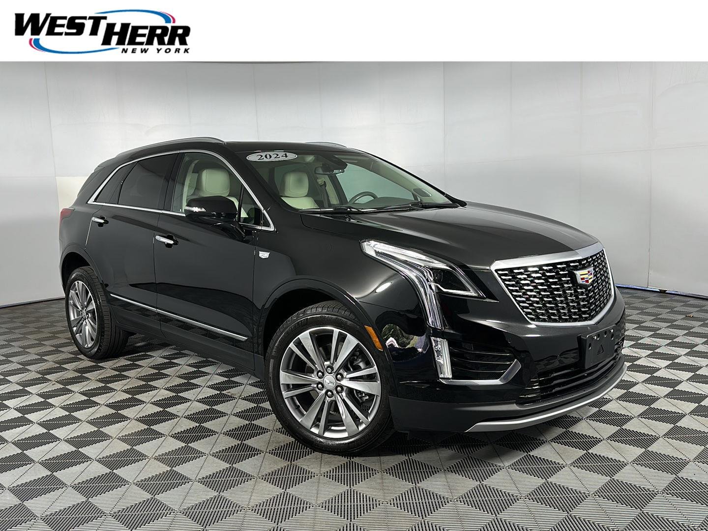 Used 2024 Stellar Black Metallic Cadillac AWD Premium Luxury image 1