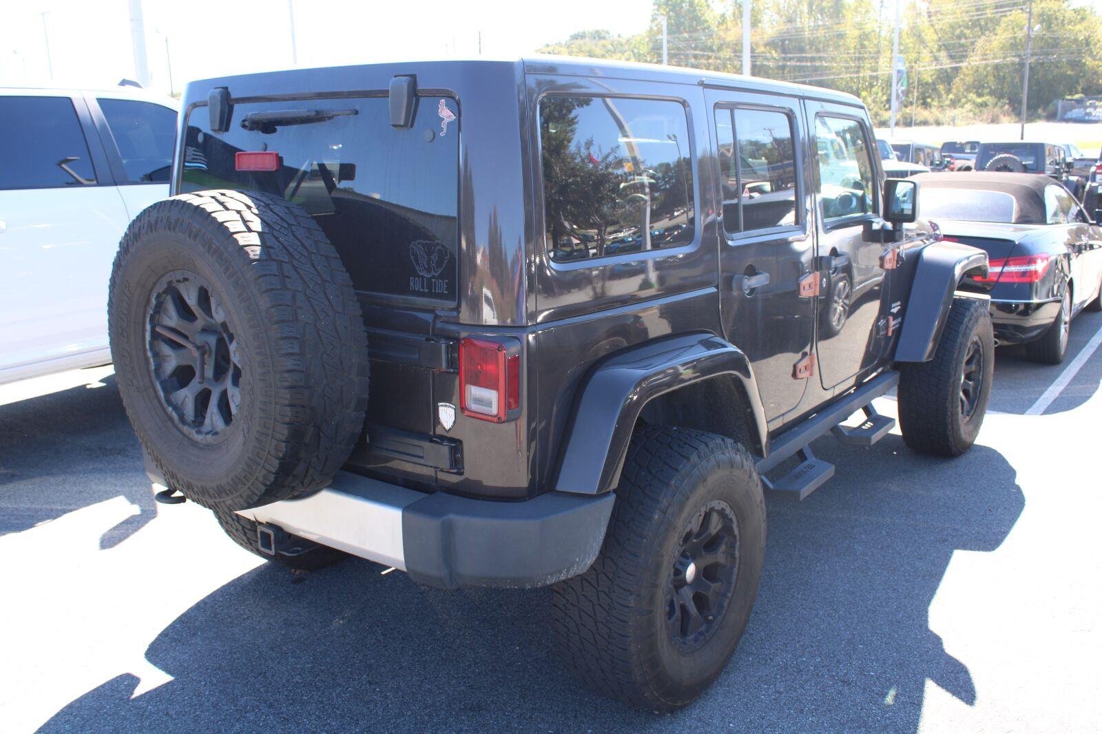 Used 2013 Rugged Brown Pearl Jeep Sahara image 5