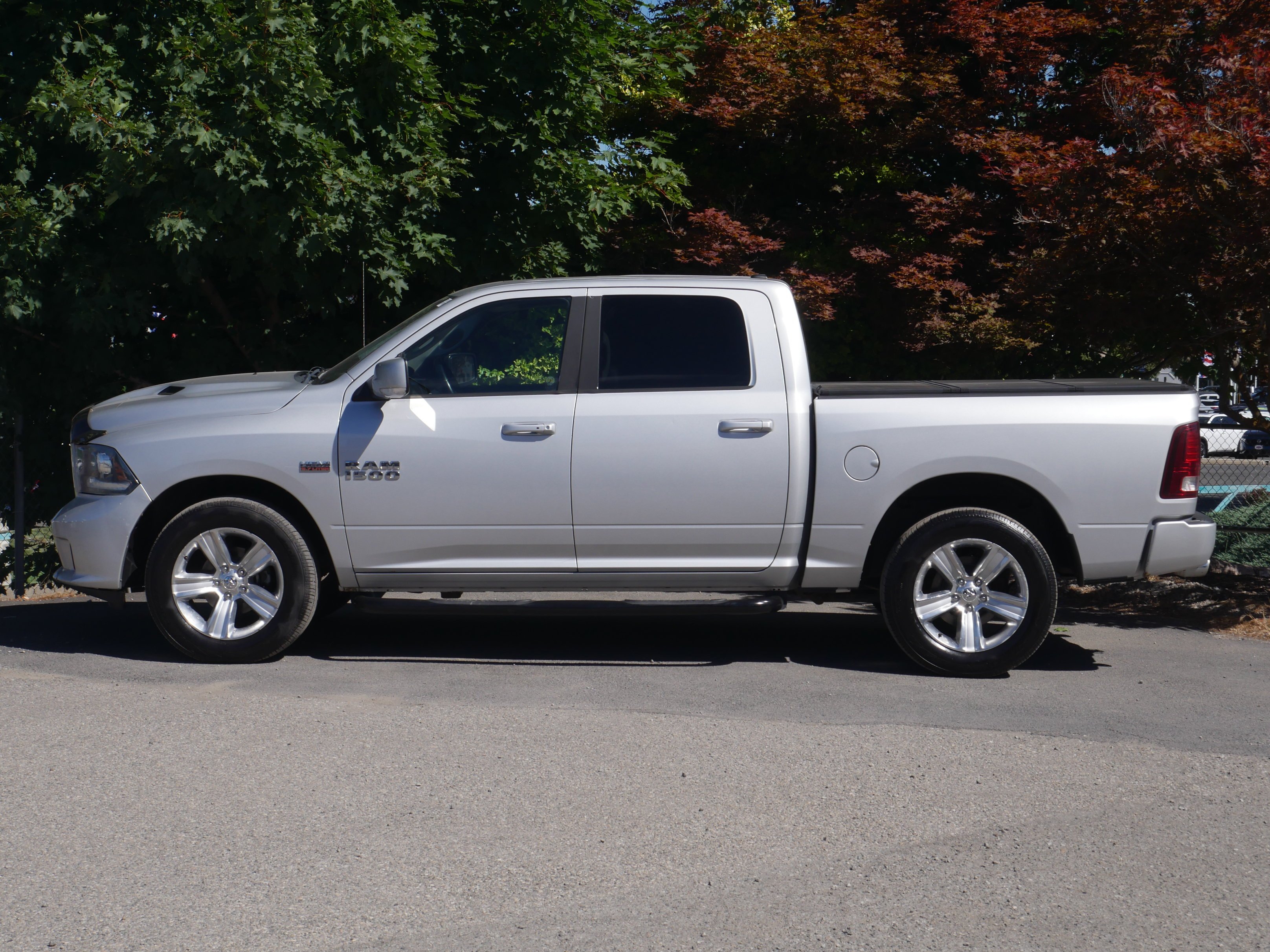 Used 2013 Bright Silver Clearcoat Metallic Ram Sport image 15