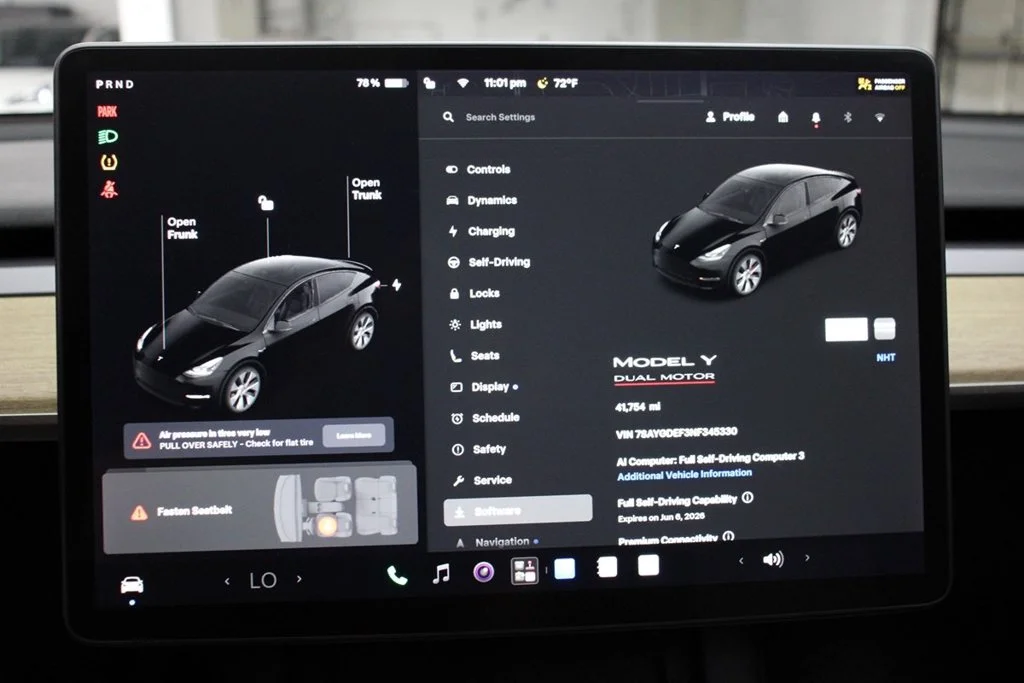 Used 2022 Solid Black Tesla Performance image 23