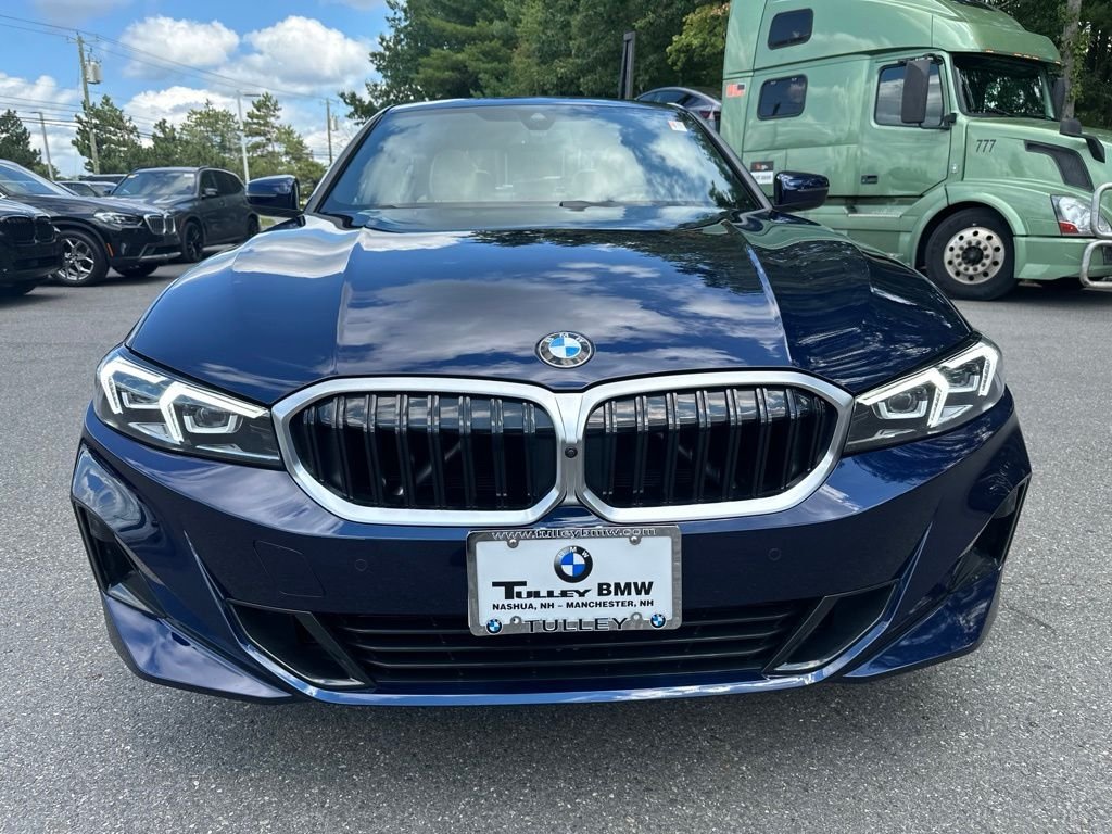 Used 2026 Tanzanite Blue II Metallic BMW 330i xDrive image 2
