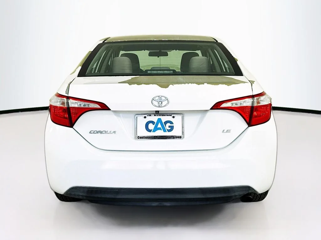 Used 2015 Super White Toyota LE image 6