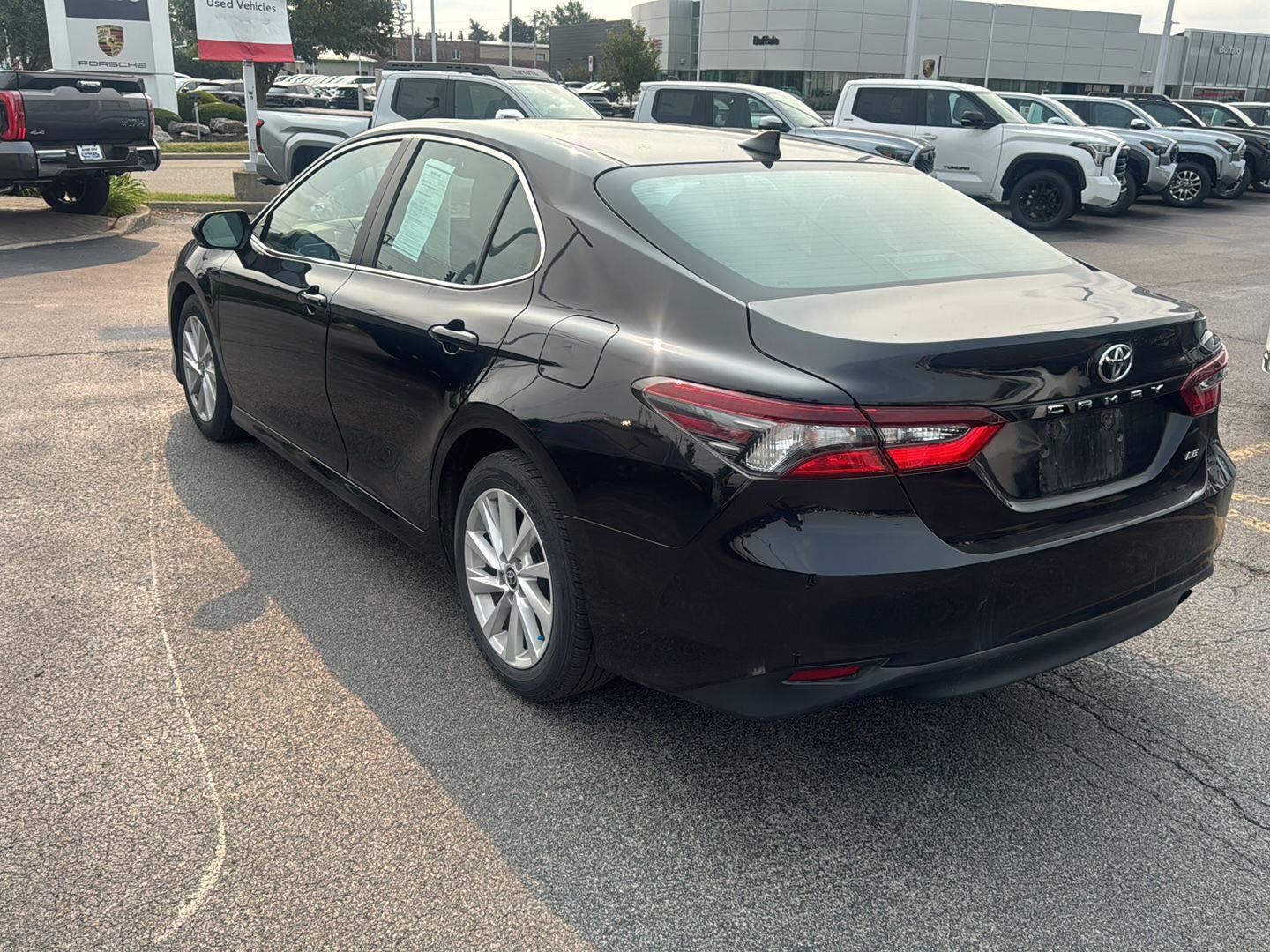 Used 2021 Midnight Black Metallic Toyota LE image 4