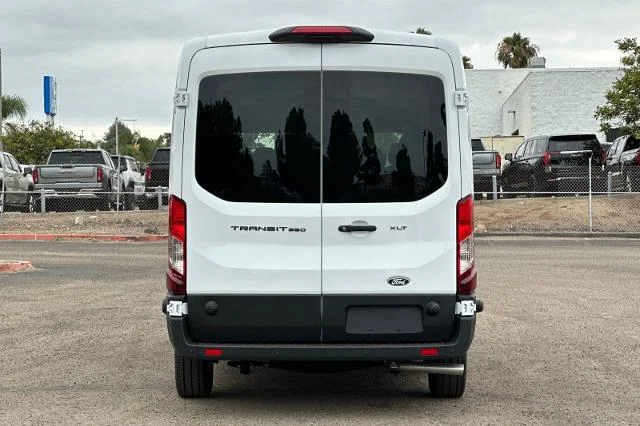 New 2026 Oxford White Ford Passenger Van XLT image 29