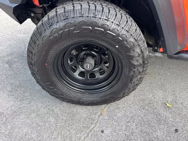 Used 2018 Orange Jeep Unlimited Sport S image 16
