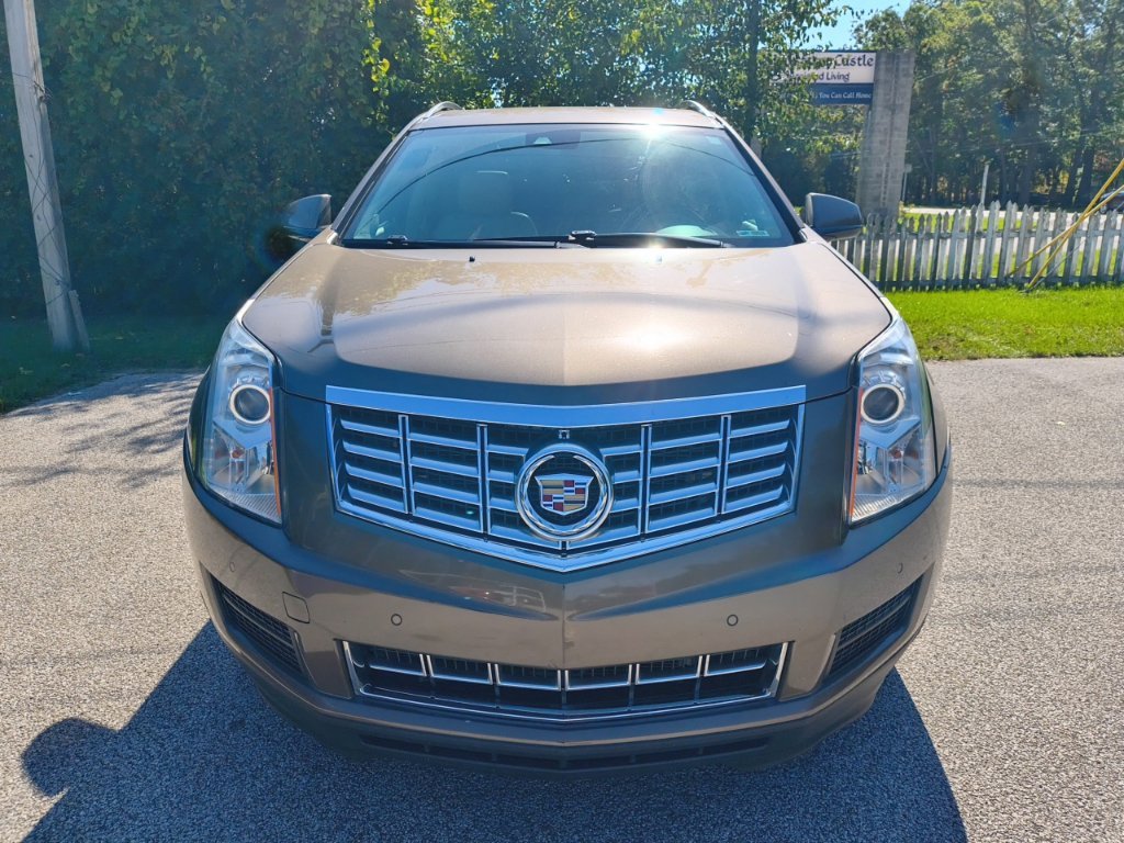 Used 2014 Cadillac SRX Luxury Collection with VIN 3GYFNEE37ES543982 for sale in Muskegon, MI