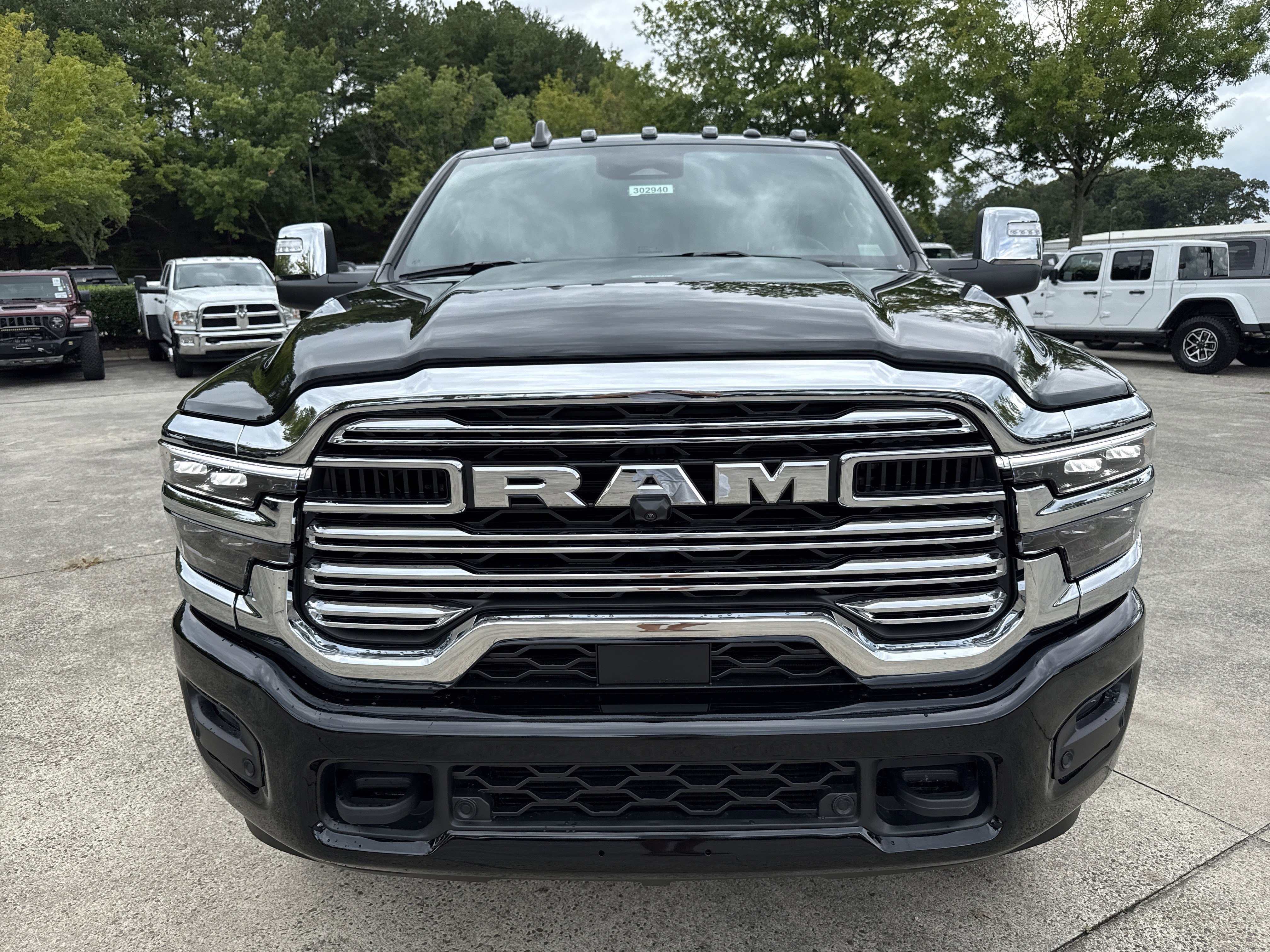New 2026 Diamond Black Crystal Pearlcoat RAM Laramie image 2