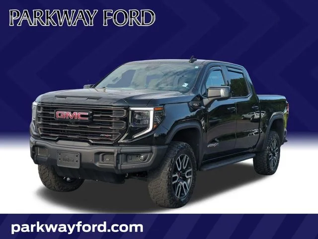 Used 2025 Black GMC AT4X image 1