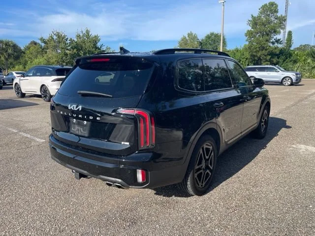 Used 2024 Ebony Black Kia SX Prestige X-Line image 2