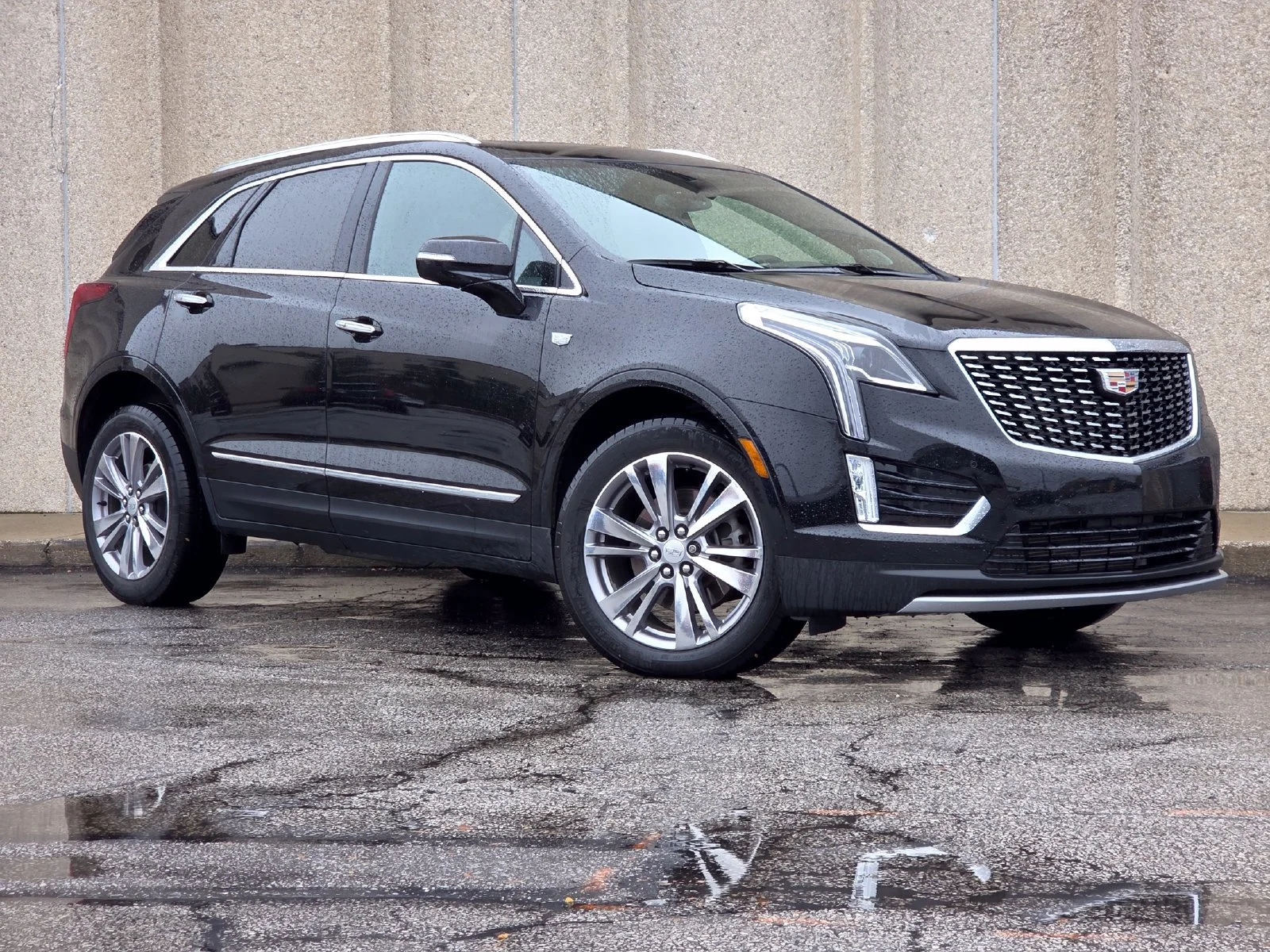 Used 2024 Stellar Black Metallic Cadillac Premium Luxury image 1