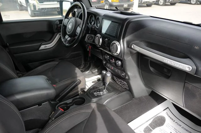 Used 2018 Black Jeep Unlimited Sahara image 15