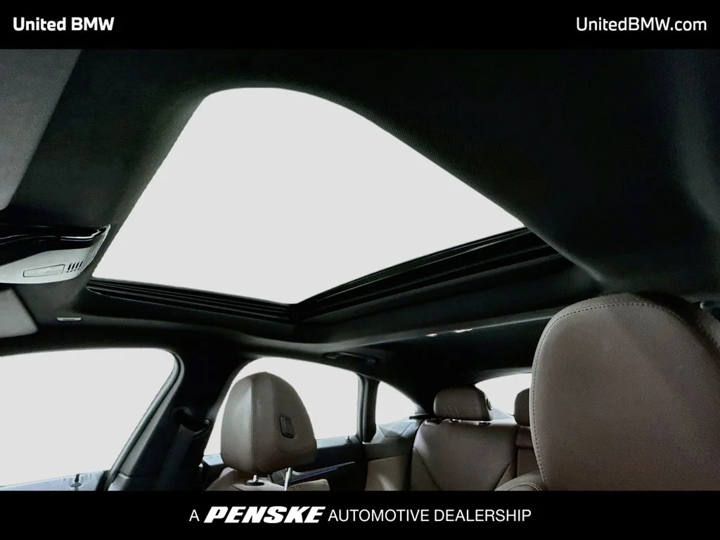 Certified Used 2025 Mineral White Metallic BMW eDrive40 image 12
