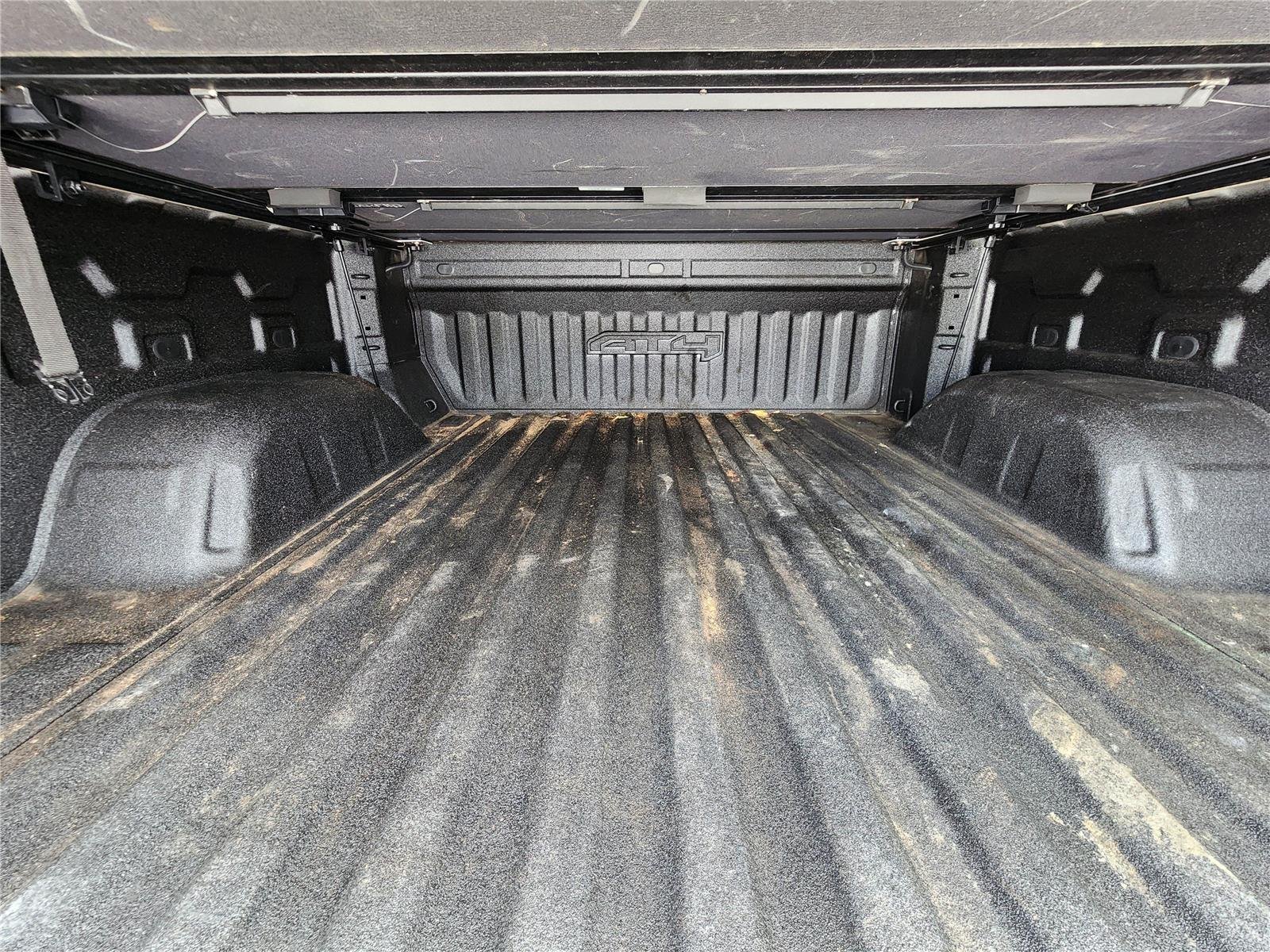 Used 2023 Desert Sand Metallic GMC AT4 image 5