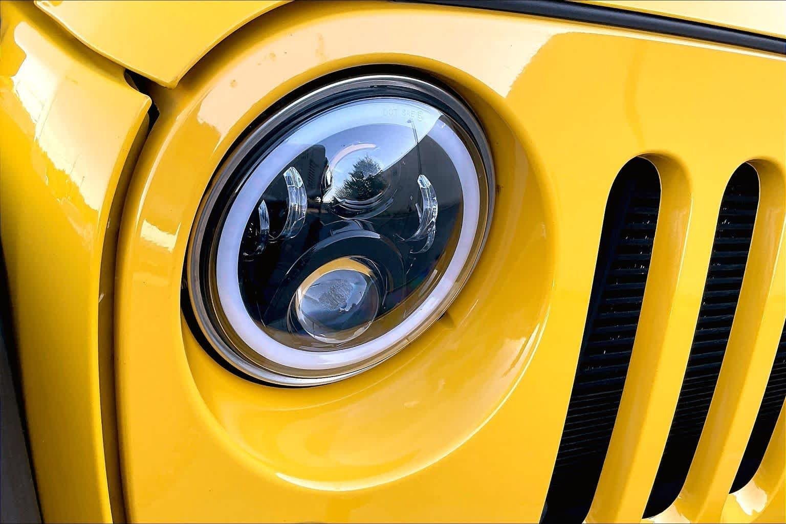 Used 2015 Baja Yellow Clearcoat Jeep Sport image 25