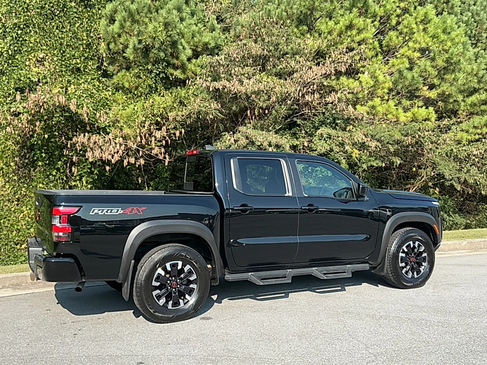 Used 2024 Super Black Nissan Crew Cab PRO-4X 4x4 image 2