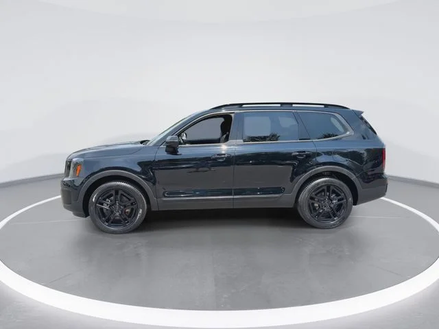 Used 2025 Black Kia EX X-Line image 5