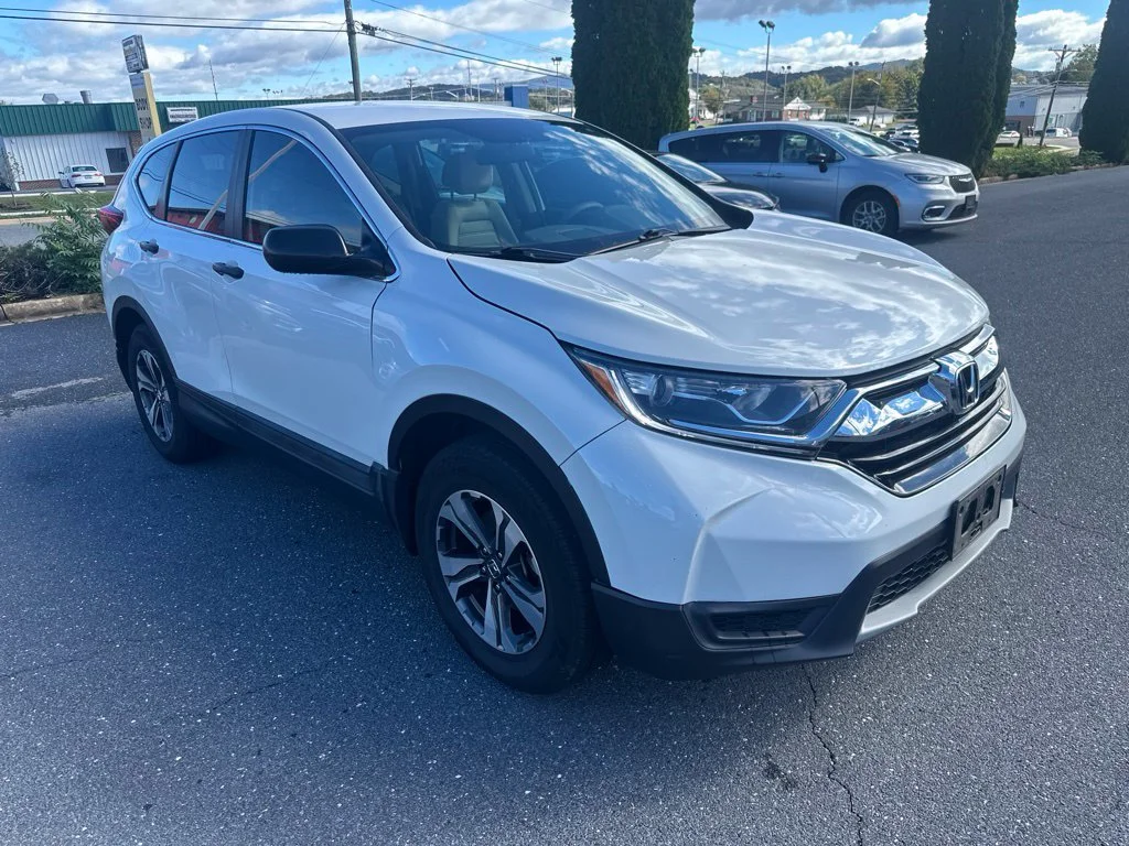 Used 2017 White Diamond Pearl Honda LX image 1
