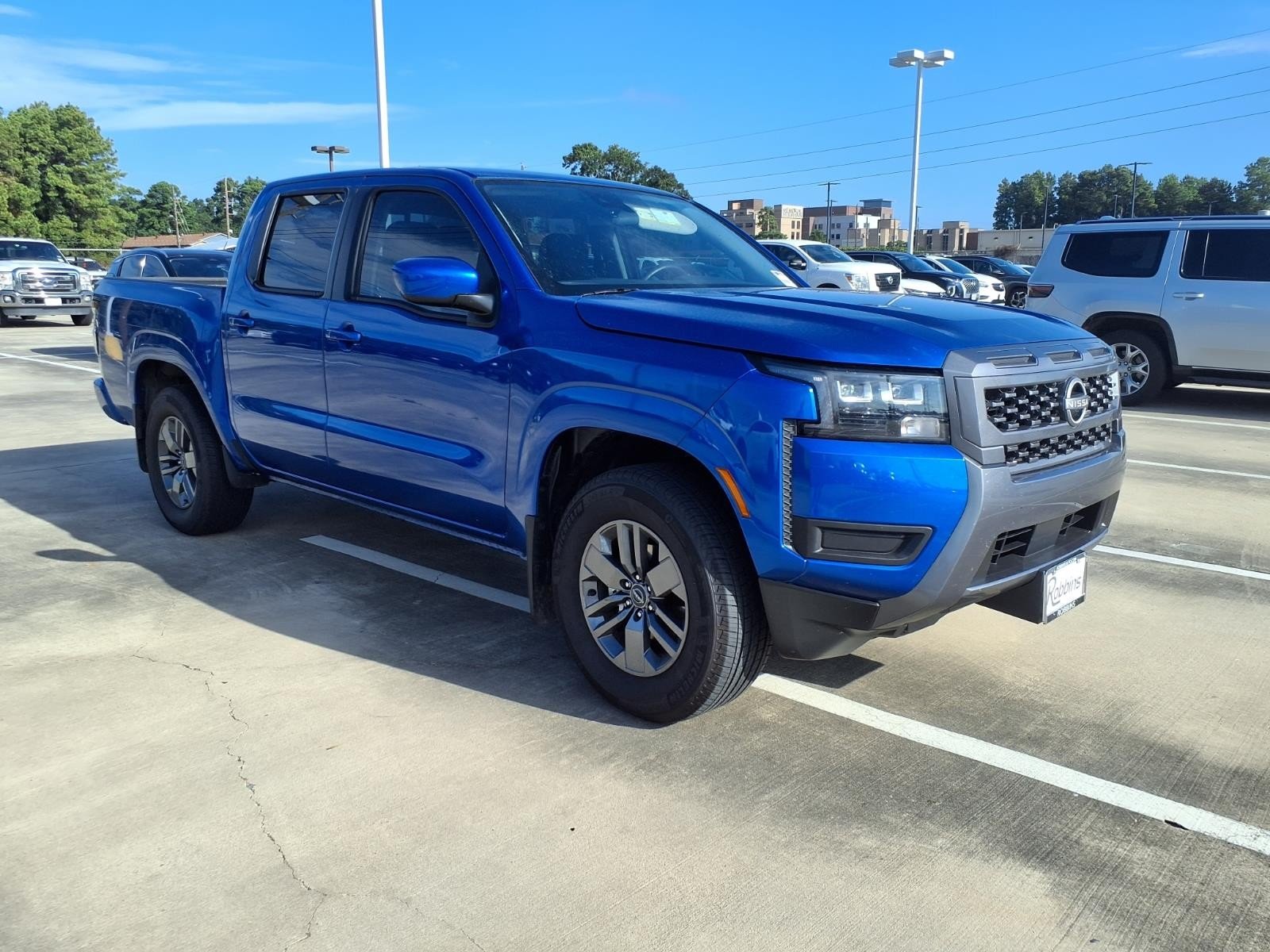 2026 Nissan Frontier SV Blue at Robbins Nissan