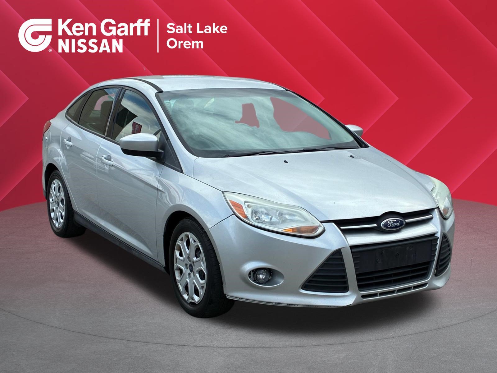 Used 2012 Ingot Silver Ford SE image 1