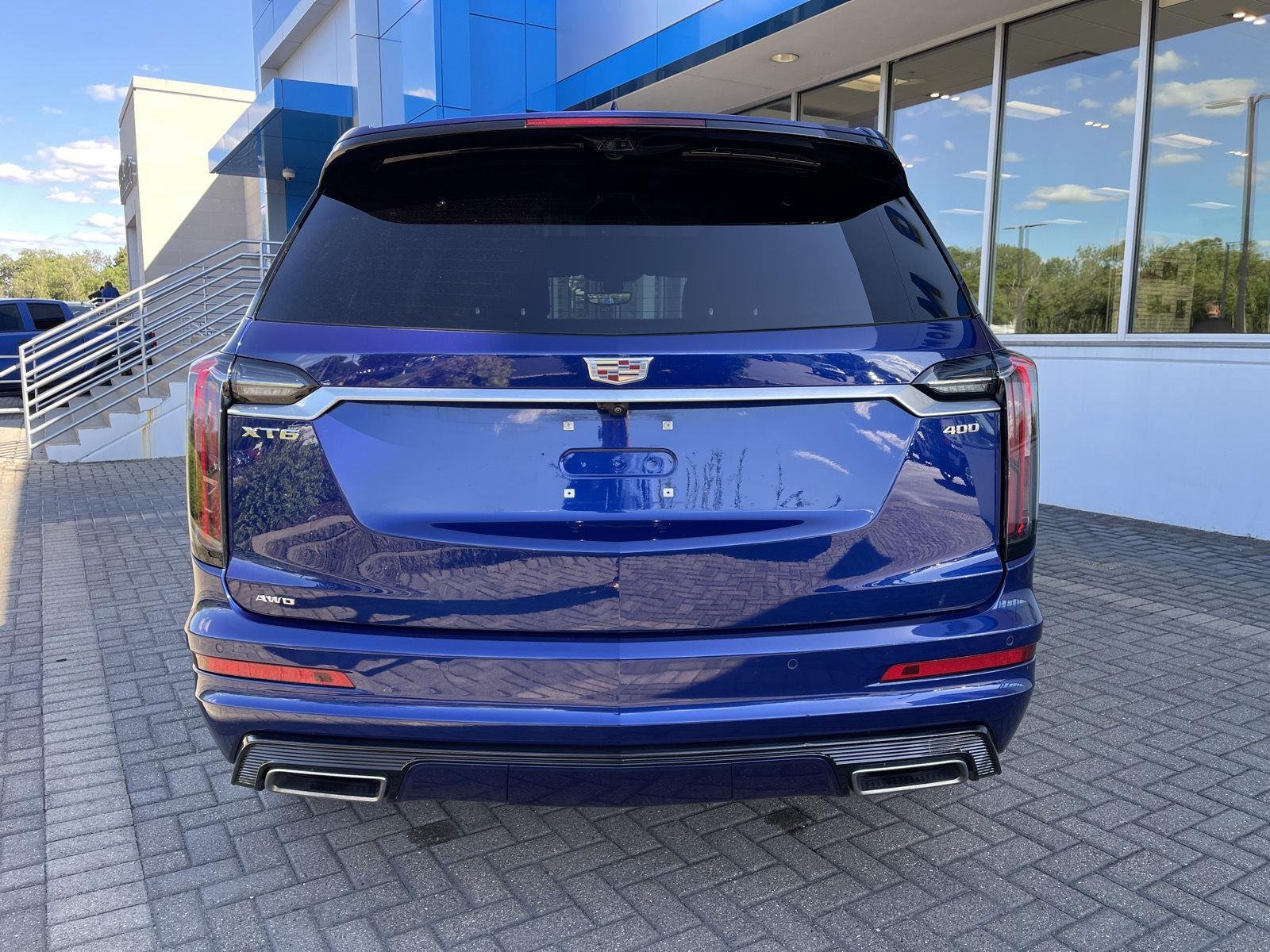 Used 2024 Opulent Blue Metallic Cadillac Sport image 4
