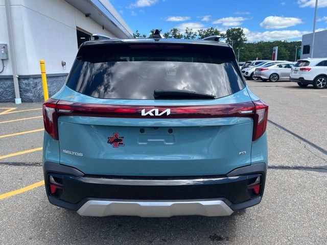 Used 2024 Pluton Blue/Black Roof Kia S image 4