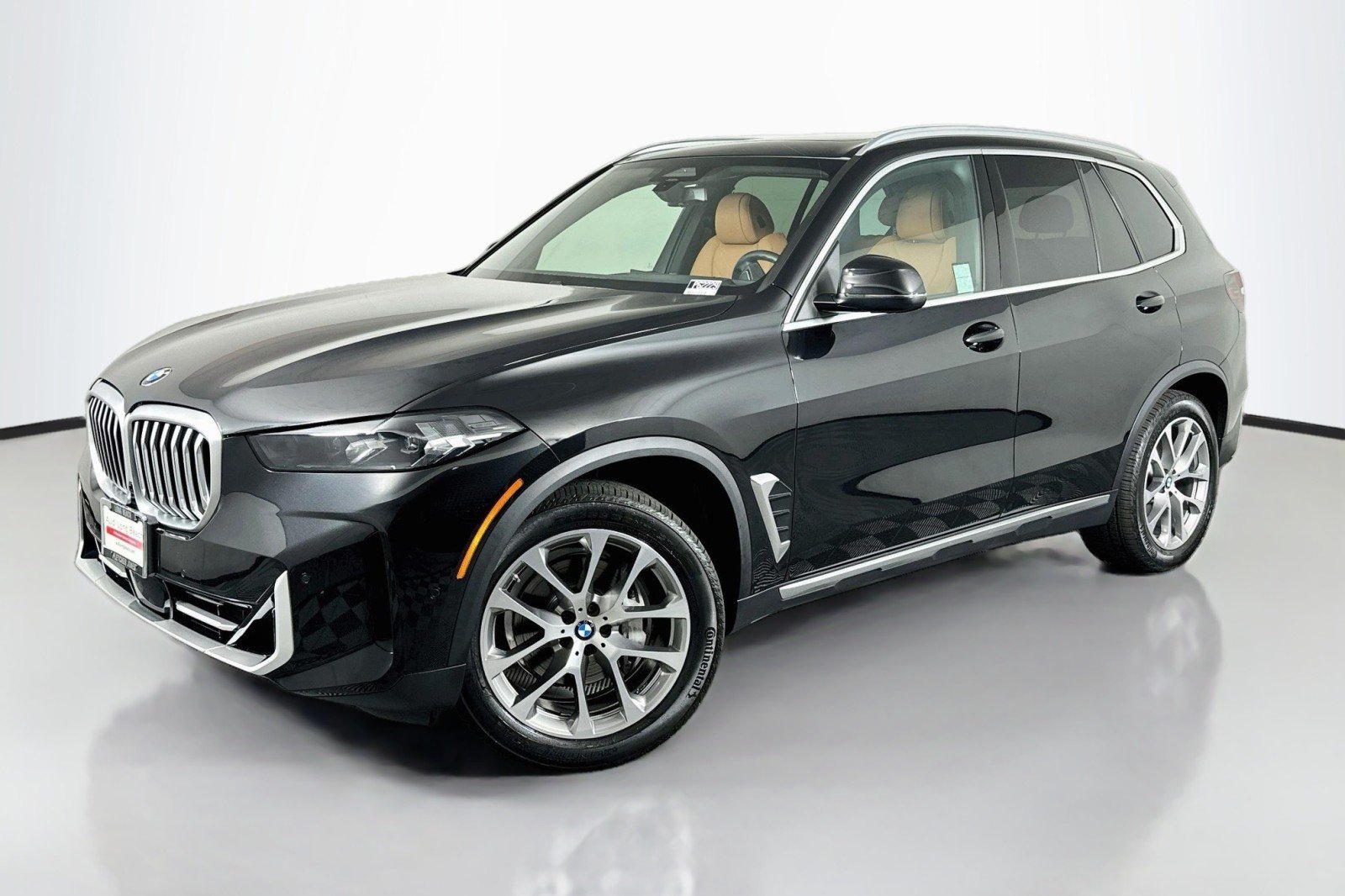 Used 2024 Black Sapphire Metallic BMW sDrive40i image 1