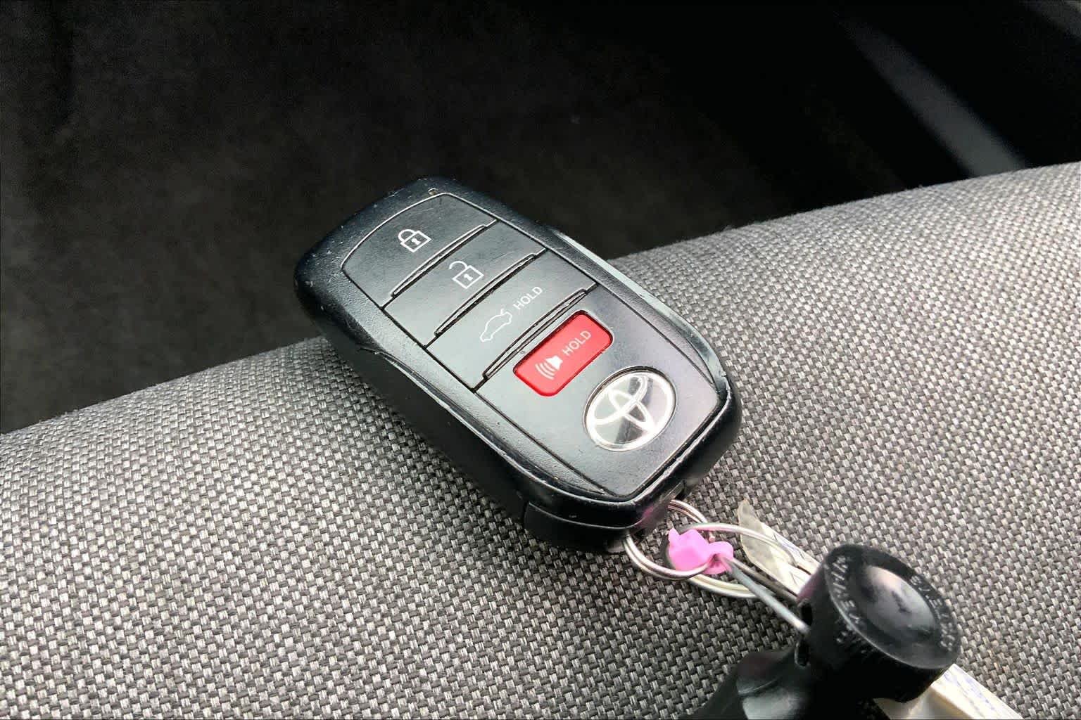 Used 2025 Reservoir Blue Toyota LE image 14