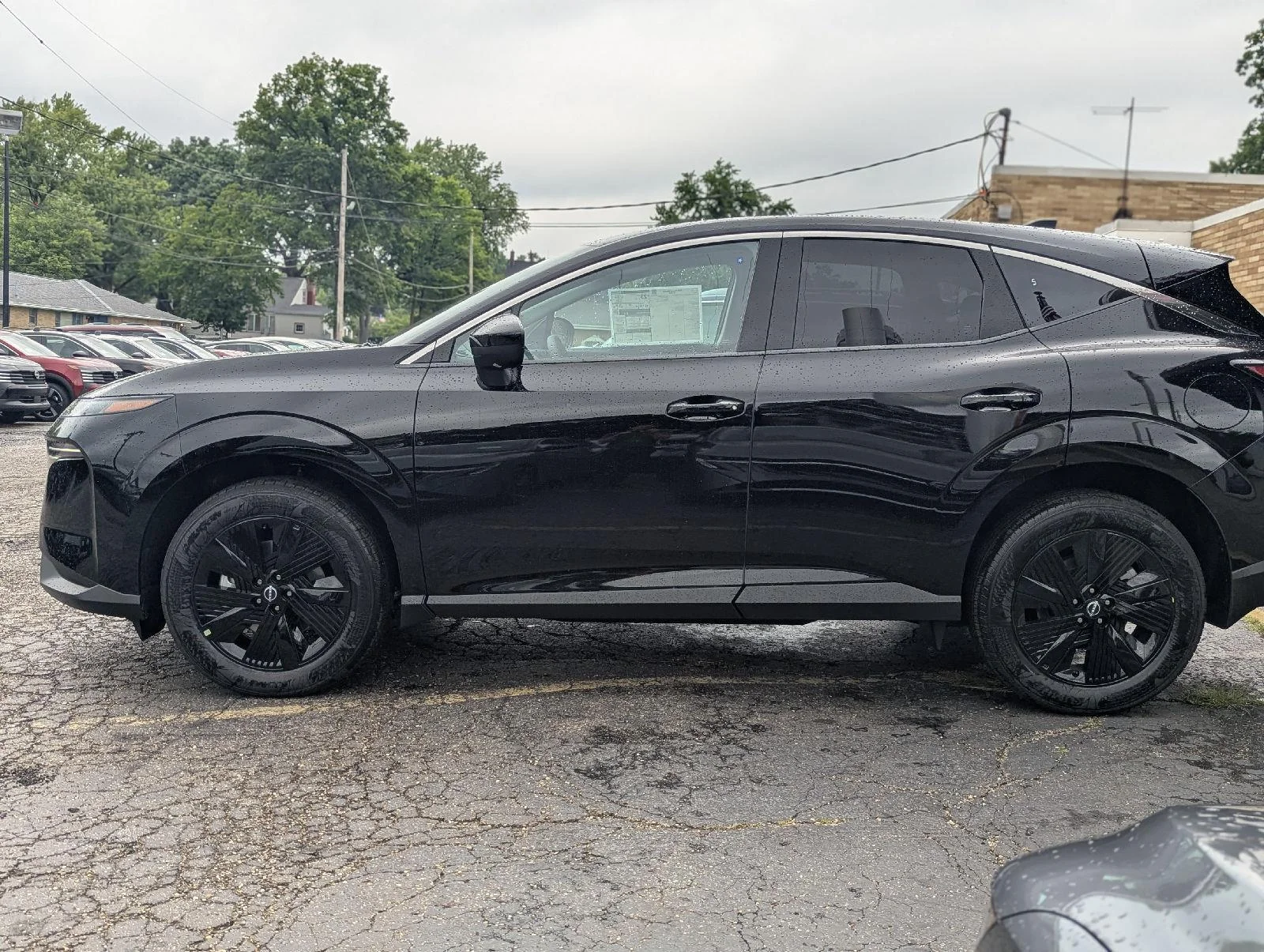 New 2026 Super Black Nissan SV image 5