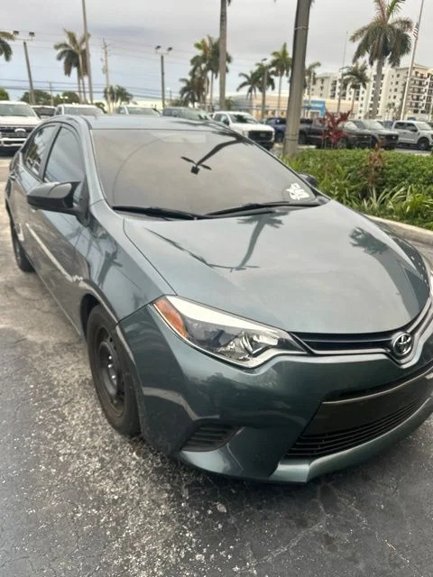 Used 2015 Slate Metallic Toyota LE image 1
