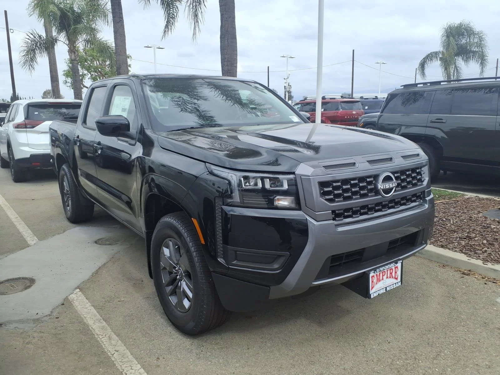 New 2026 Super Black Nissan Crew Cab SV image 5
