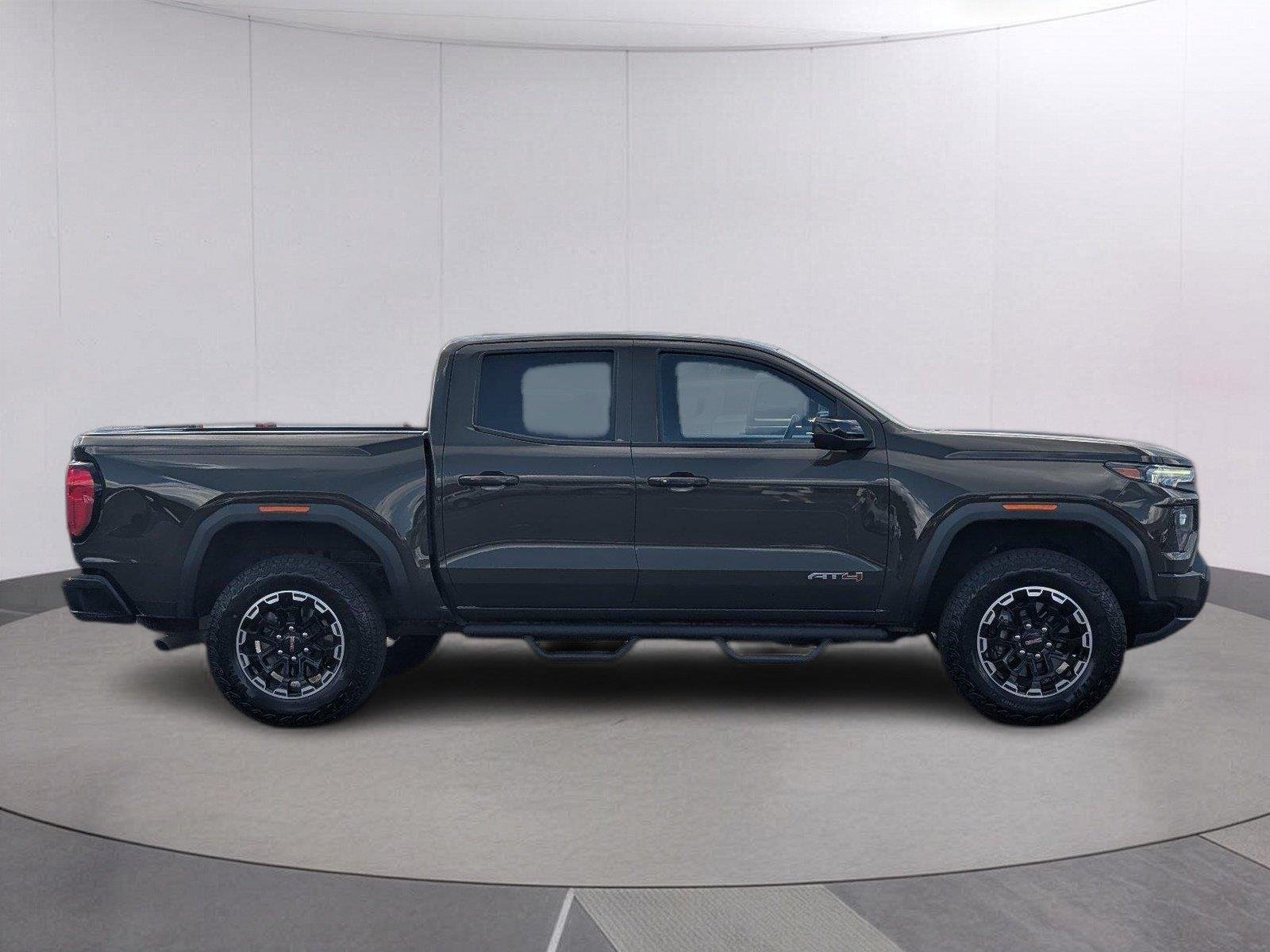 Used 2024 Deep Bronze Metallic GMC AT4 image 8