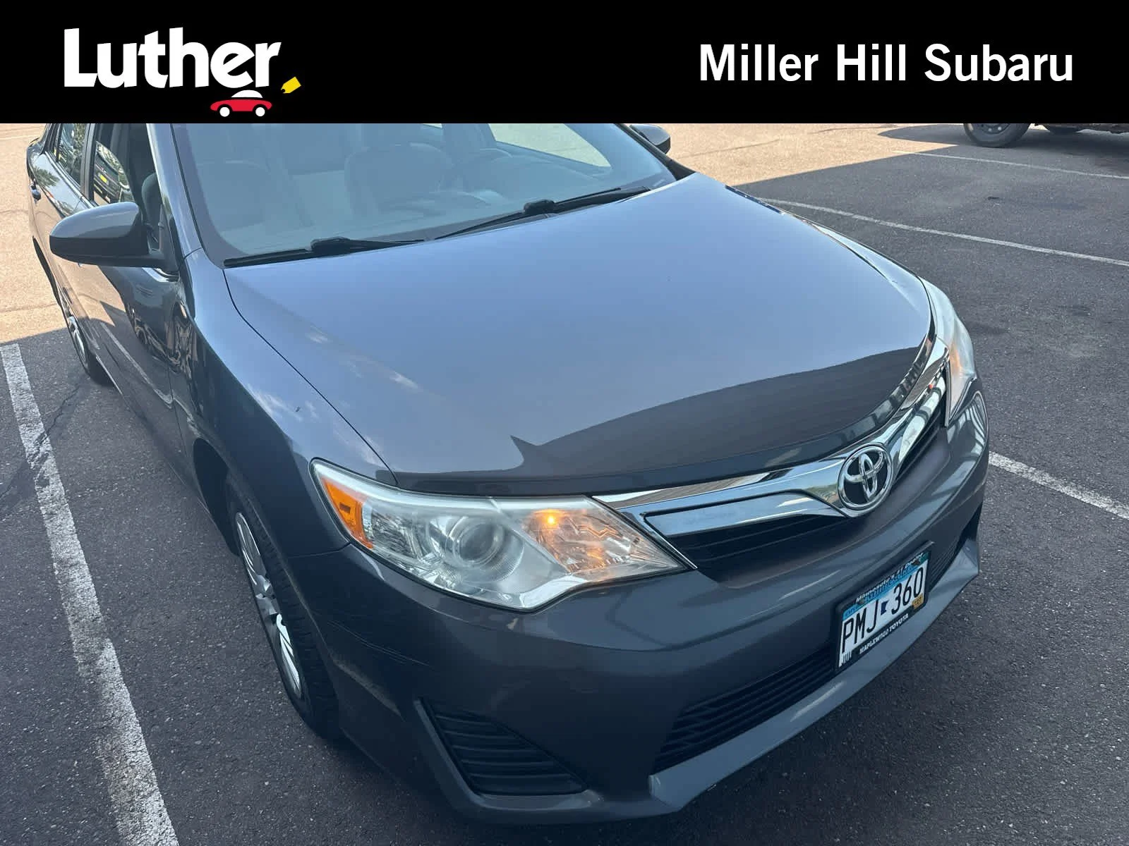 Used 2014 Magnetic Gray Metallic Toyota LE image 1