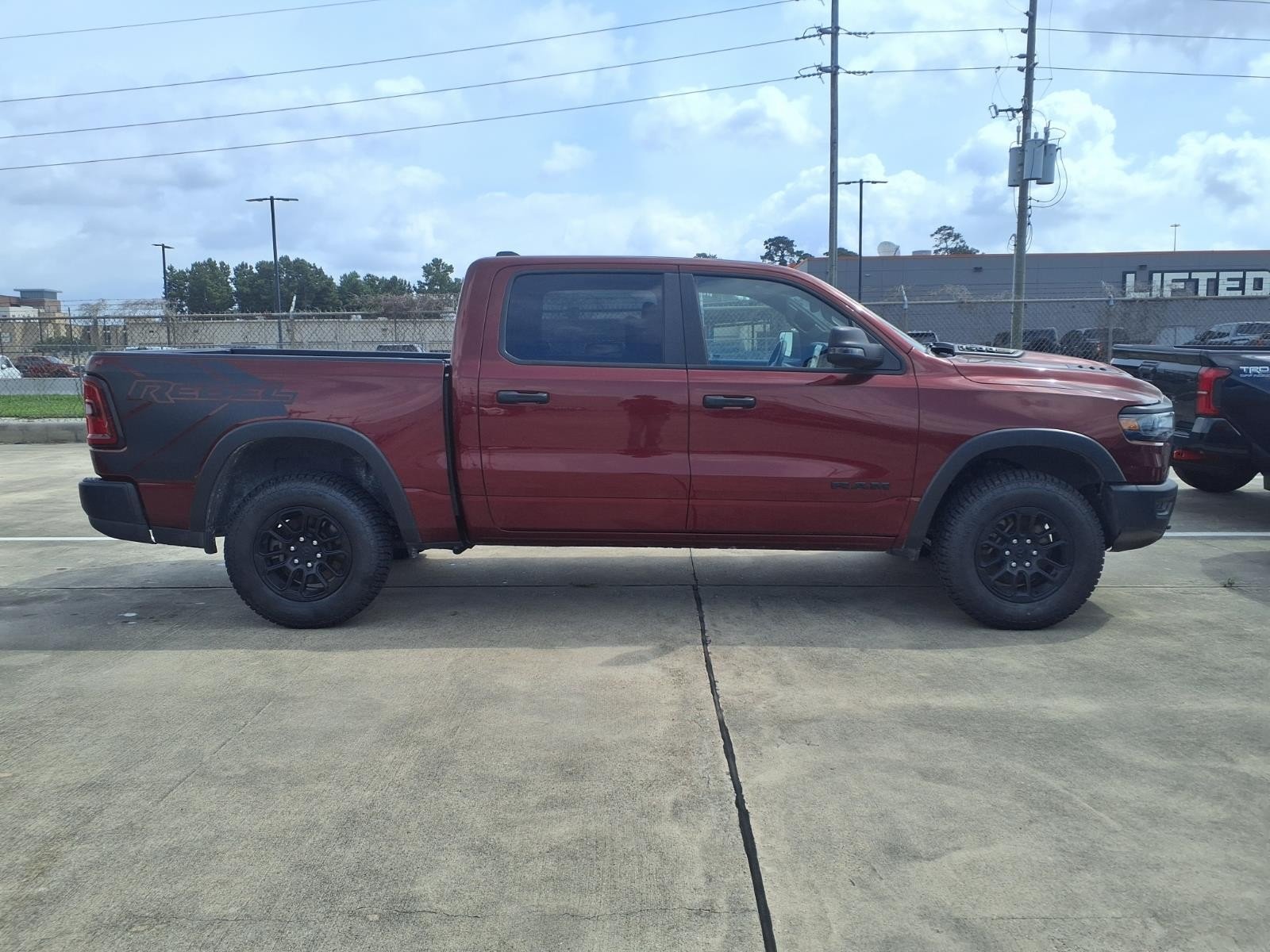 2025 Ram 1500 Rebel Red at Robbins Nissan