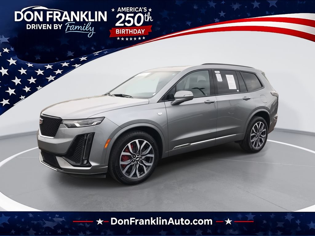 Used 2024 Silver Cadillac Sport image 1
