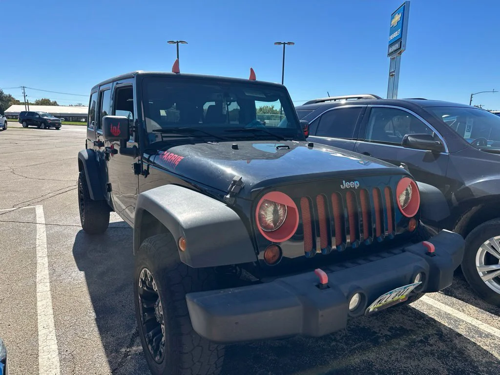 Used 2013 Black Jeep Unlimited Sport image 6